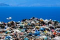 Waste disposal site with seagulls scavenging for food Royalty Free Stock Photo