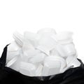 Waste Garbage foam food tray white many pile on the plastic black bag dirty isolated on white background, Trash, Recycle, foam