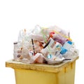 Waste heap, Waste Garbage trash plastic full of trash bin yellow, Plastic bag waste Lots of junk isolated on white background Royalty Free Stock Photo