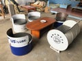 Waste from oil drums is blue and white in color which can be used to make chair furniture in cafes