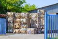 Waste paper bales at a processing plant. Protection against environmental pollution.