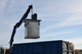 Waste recycling in separated waste containers. the bottom lid opens when the crane is pulled over the body of the truck, the raw m