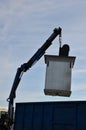 Waste recycling in separated waste containers. the bottom lid opens when the crane is pulled over the body of the truck, the raw m