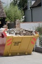 Waste skip full of builders rubbish