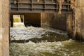 Waste Water flowing from city drain pipe. Royalty Free Stock Photo