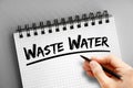 Waste water text on notepad, concept background Royalty Free Stock Photo