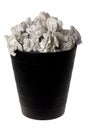 Wastepaper basket full of crumpled paper Royalty Free Stock Photo