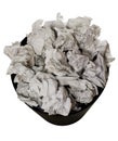 Wastepaper basket full of crumpled paper