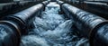 Wastewater pipes from industrial plants which is a large pipe made of metal. The wastewater flowing from the pipe is black and