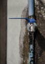 Wasting water - water drop from water tap, Leaky or tap, water tap in toilet and bathroom Royalty Free Stock Photo