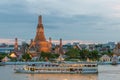 Wat Arun and cruise ship in night ,Bangkok city ,Thailand