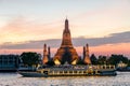 Wat Arun and cruise ship in night ,Bangkok city ,Thailand