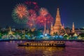 Wat arun and cruise ship in night time under new year celebration, Bangkok city ,Thailand Royalty Free Stock Photo