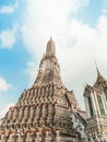 Wat Arun Temple of dawn the famous beautiful landmark in Bangkok Thailand. Wat Arun temple in a blue sky. Wat Arun is a Buddhist Royalty Free Stock Photo