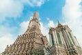 Wat Arun Temple of dawn the famous beautiful landmark in Bangkok Thailand. Wat Arun temple in a blue sky. Wat Arun is a Buddhist Royalty Free Stock Photo