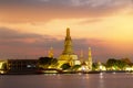 Wat Arun Temple and Chao Phraya River With sunset evening light in Bangkok Thailand Royalty Free Stock Photo