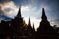 Wat Chai Wattanaram ruins silhouette with sun shining through