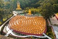 Wat Chak Yai temple, golden buddha and hundreds of monks, in Chanthaburi, Thailand