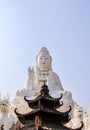 Rimkok district,Chiang Rai Province,Northern Thailand on January 19,2020:Enormous white Guan Yin Statue and beautiful dragon