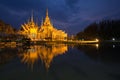 Wat Luang Pho Toh temple with water reflection in night time, Th Royalty Free Stock Photo