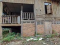 A derelict wooden house at a Thai temple