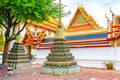 Wat Pho temple in Bangkok city, Thailand. View of pagoda and stupa in famous ancient temple. Religious buildings in buddhism style Royalty Free Stock Photo