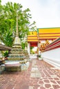 Wat Pho temple in Bangkok city, Thailand. View of pagoda and stupa in famous ancient temple. Religious buildings in buddhism style Royalty Free Stock Photo