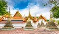 Wat Pho temple in Bangkok city, Thailand. View of pagoda and stupa in famous ancient temple. Religious buildings in buddhism style Royalty Free Stock Photo