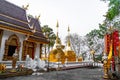 Wat Phra That Doi Tung, famous temple north of Thailand. Thai Wording at center-bottom of image that left side means PLEASE TAKE Royalty Free Stock Photo