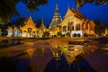 Wat Phra Sing with the water reflection after rainning, Chiang Mai, Thailand. Royalty Free Stock Photo