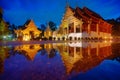 Wat Phra Sing with the water reflection after rainning, Chiang Mai, Thailand. Royalty Free Stock Photo