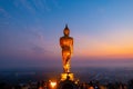 Wat Phrathat Khao Noi with Sunrise and the mist. This temple is the best location view of Nan province, Thailand. Buddha statue, Royalty Free Stock Photo