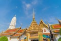 Wat Rakhang Khositaram, a Buddhist temple stupa at noon with blue sky in Bangkok city, Thailand. Thai architecture buildings Royalty Free Stock Photo