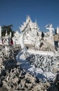 Wat Rong Khun entrance bridge and `the cycle of rebirth`