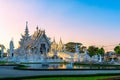 Wat Rong KhunWhite templeat sunset in Chiang Rai, Thailand.