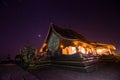 Wat Sirindhorn Phu Praw and night sky, Thailand