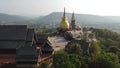 Wat Somdet Phu Ruea Ming Mueang Temple 4k fly over aerial view.