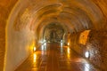 Wat U-mong stone buddha statue in cave hall way Royalty Free Stock Photo