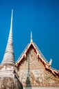 Wat Uposatharam Temple or Wat Bot at noon under clear blue sky,