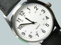 Watch from above. A fashionable, trendy, stylish and high end mens wristwatch. Closeup watch face in studio isolated