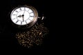 The watch carries an antique bag placed on a black background Royalty Free Stock Photo