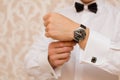 Watch on the groom's hand