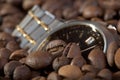 Watch in a heap coffee grains Royalty Free Stock Photo