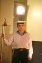 Watch military sailor in the guard at the ship's bell.