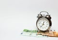 Watch and money isolate. Concept Time is money. Royalty Free Stock Photo