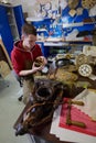 Watch restoration workshop of the state hermitage. Restorer at work repairs gears, watchmaker tools on the table