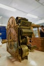 Watch restoration workshop of the state hermitage. Restorer at work repairs gears, watchmaker tools on the table