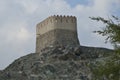 A watch tower behind Al Badiyah Mosque