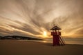 Watch tower on empty sand beach by the sea at sunset, Montenegro, Ulcinj,.Long beach Royalty Free Stock Photo