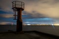 A watch tower at the end of a pier. Royalty Free Stock Photo